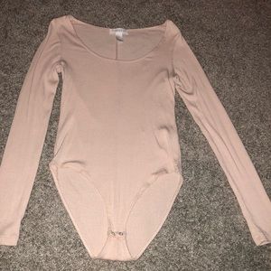 Baby pink body suit